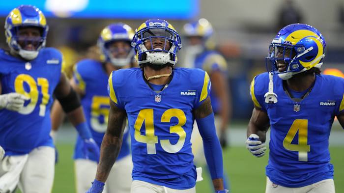 Rams safety John Johnson III (center)